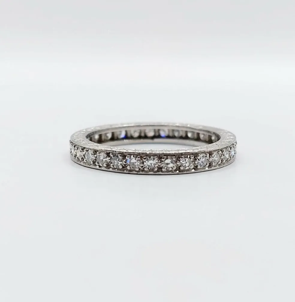 Alliance américaine or blanc 18k et 0,93 carats diamant et monture ciselée