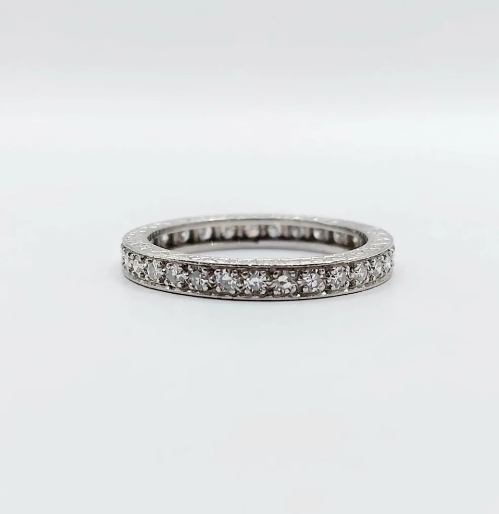 Alliance américaine or blanc 18k et 0,93 carats diamant et monture ciselée