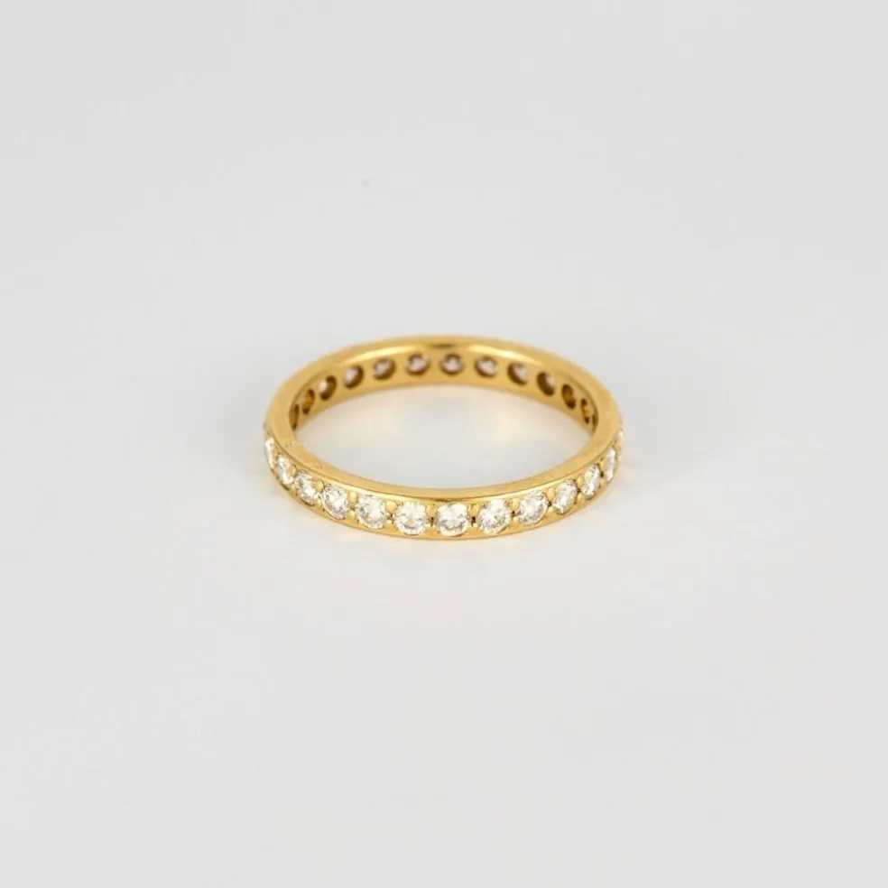Alliance américaine or jaune et diamants.