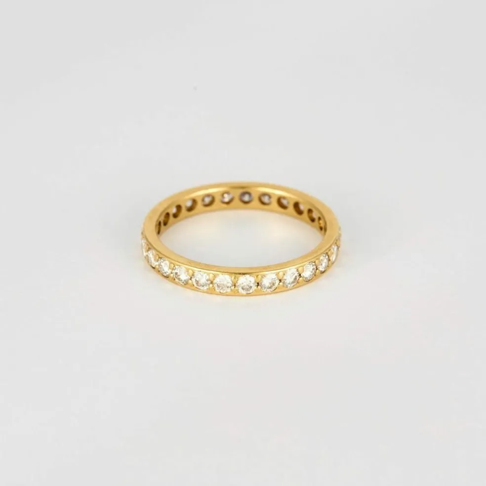 Alliance américaine or jaune et diamants.