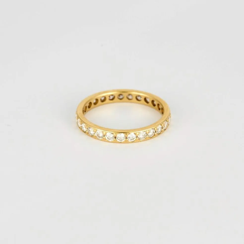 Alliance américaine or jaune et diamants.
