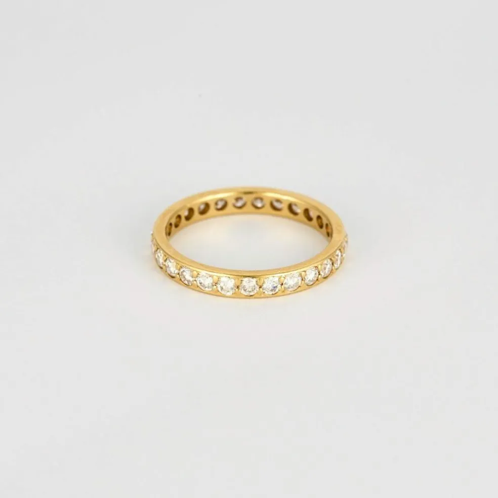 Alliance américaine or jaune et diamants.