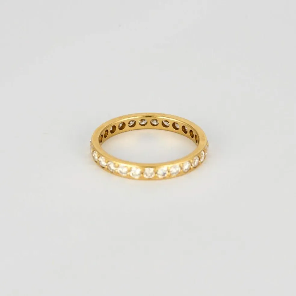 Alliance américaine or jaune et diamants.