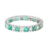 Alliance en diamant et émeraudes sur or gris
