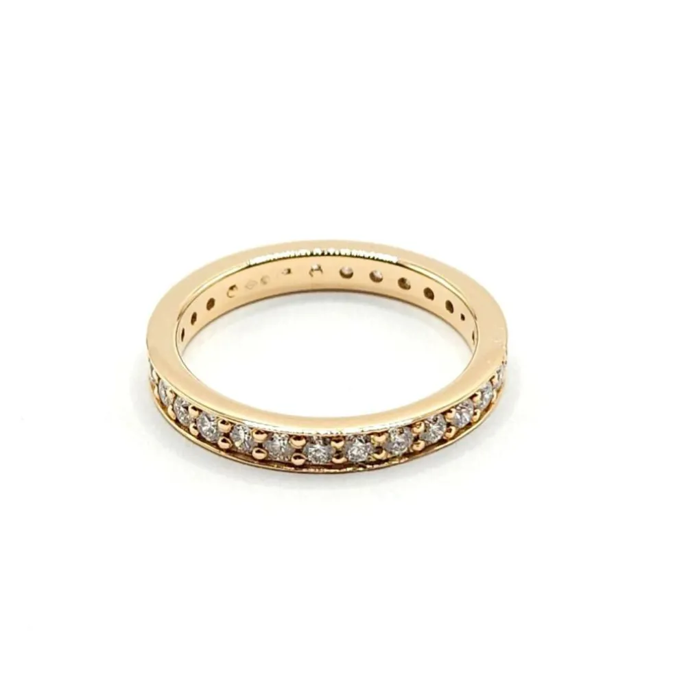 Alliance or rose sertie de diamants