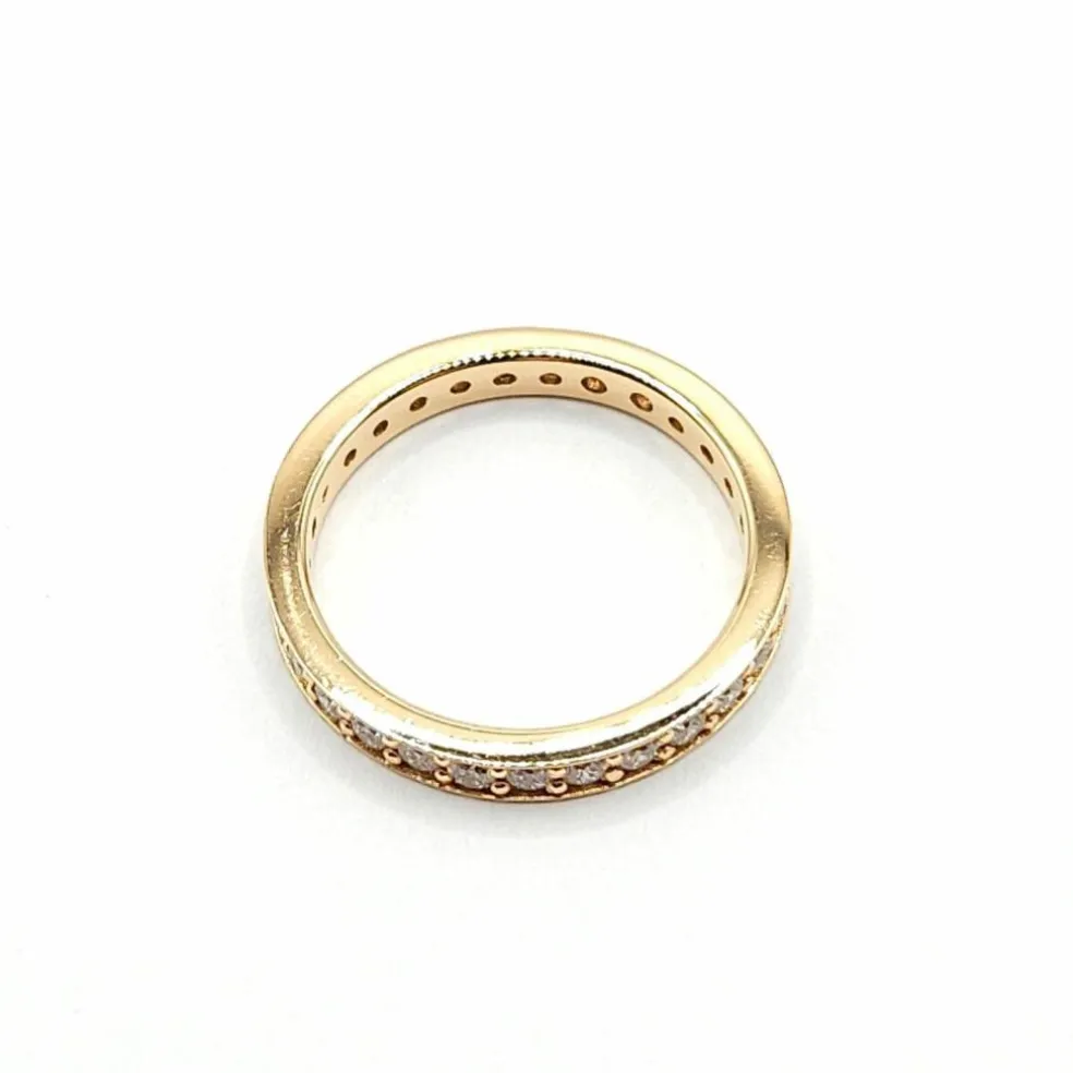 Alliance or rose sertie de diamants