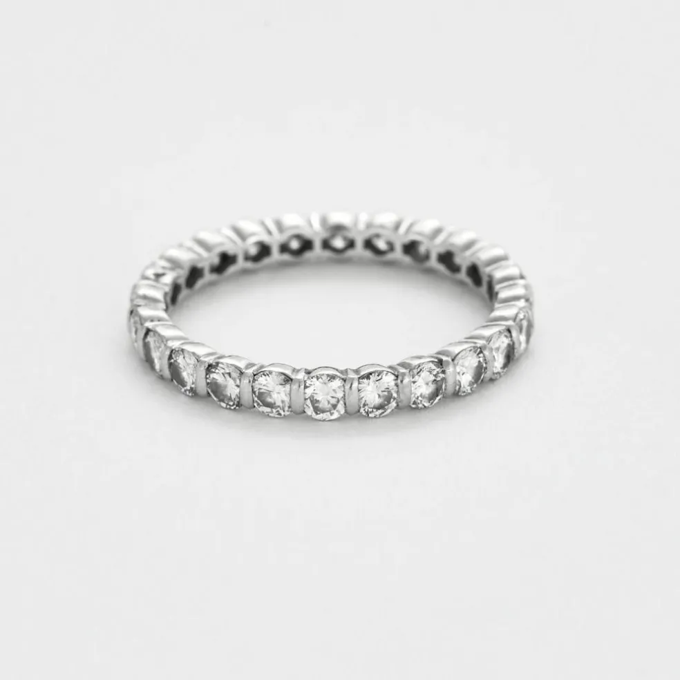 Alliance platine, or gris et diamants