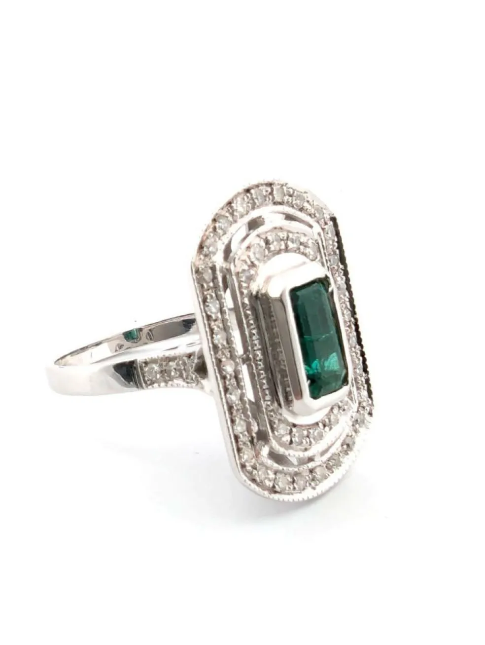 Anneau en or blanc avec émeraude et diamants centraux