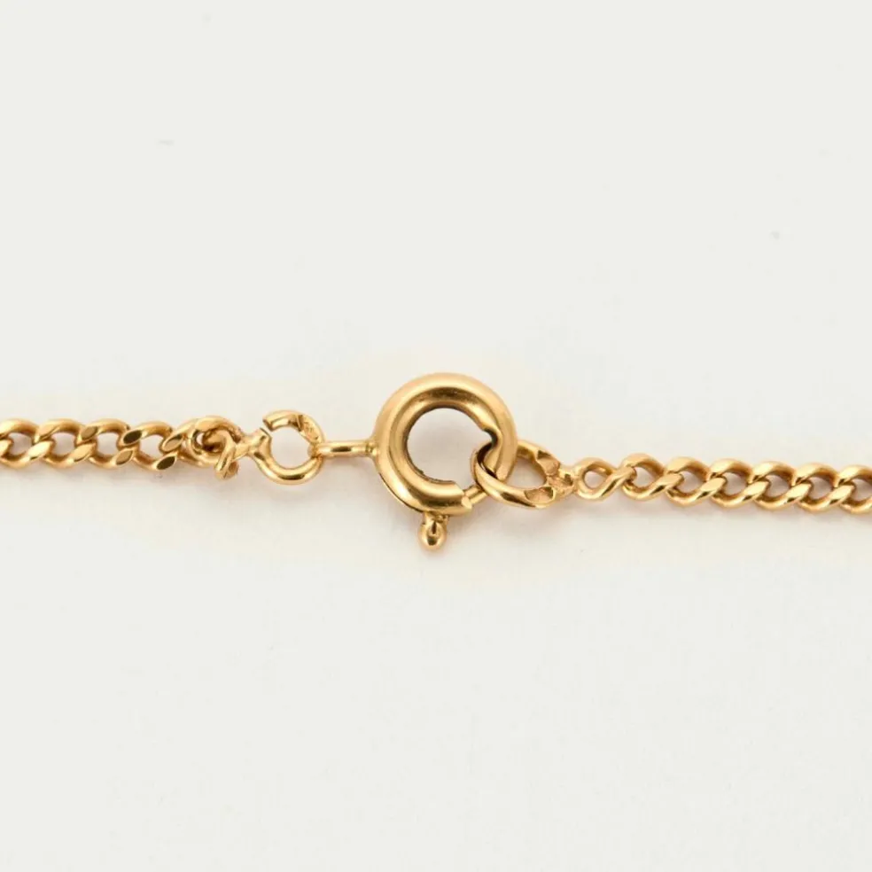 AUGIS - Collier en or jaune retenant une médaille sentimentale