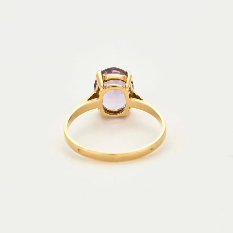 Bague en or jaune et améthyste