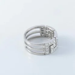 Bague à motifs grecs, diamants et platine