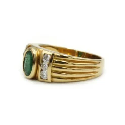 Bague - Or jaune émeraude et diamants