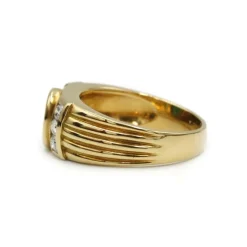 Bague - Or jaune émeraude et diamants