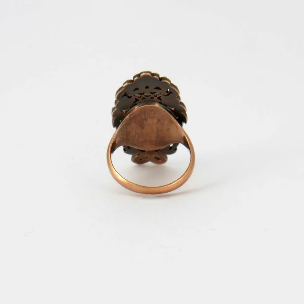 Bague à portrait en or rose, diamant et rubis