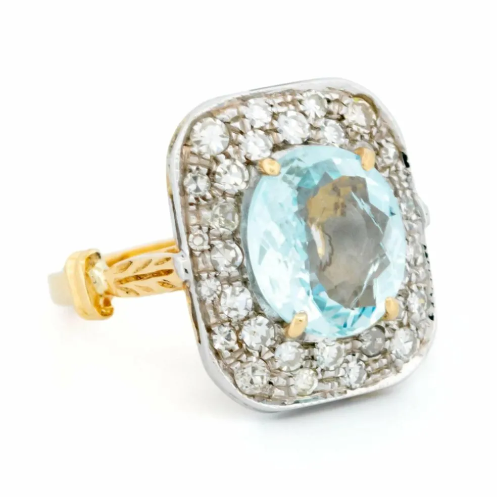 Bague aigue-marine entourage diamant