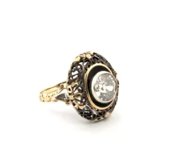 Bague ancienne en or jaune et argent avec diamant