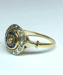 Bague ancienne or jaune et or gris, diamants et saphirs