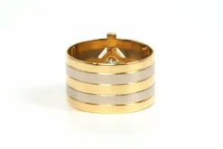 Bague Années 70 or jaune et blanc, diamant taille baguette