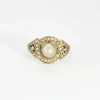 Bague Art déco, deux ors, perle bouton et diamants