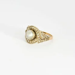 Bague Art déco, deux ors, perle bouton et diamants