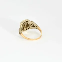 Bague Art déco, deux ors, perle bouton et diamants