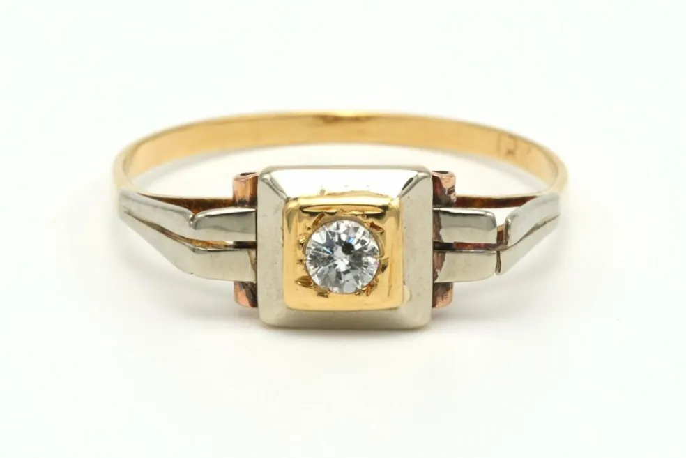 Bague Art Déco en or jaune et blanc 18 carats sertie d'un diamant
