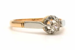 Bague Art Déco en or jaune 18 carats sertie d'un diamant (+/- 0.28 ct)