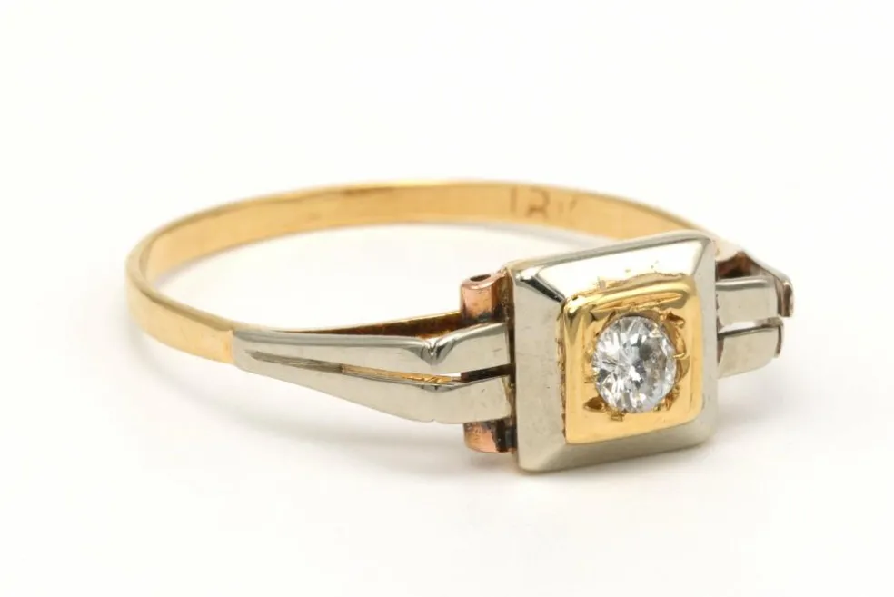Bague Art Déco en or jaune et blanc 18 carats sertie d'un diamant