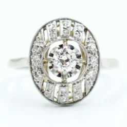 Bague Art Deco or platine et diamants