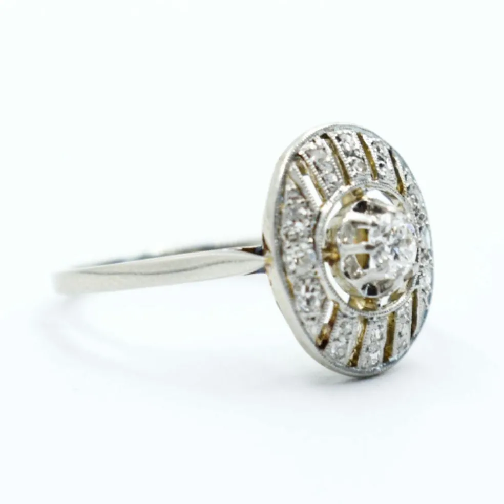 Bague Art Deco or platine et diamants