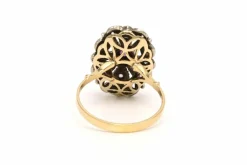 Bague Art Nouveau en or jaune et blanc 14 carats sertie d'un rubis naturel et de diamants