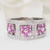 Bague bandeau en or blanc, topazes roses et diamants