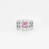Bague bandeau en platine, saphir rose et diamants