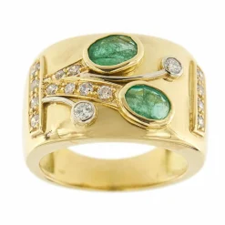 Bague bandeau émeraudes et diamants