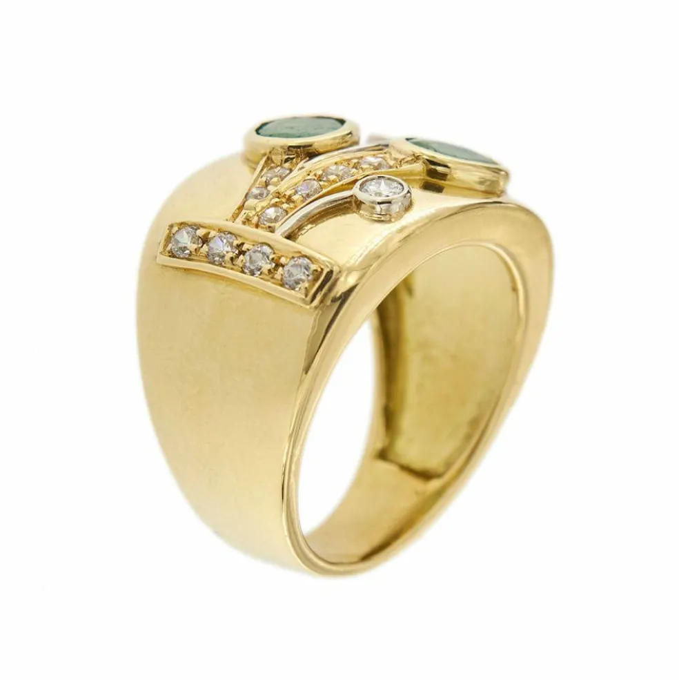 Bague bandeau émeraudes et diamants