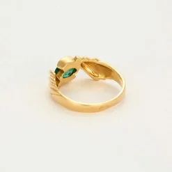 Bague bandeau or jaune, émeraude