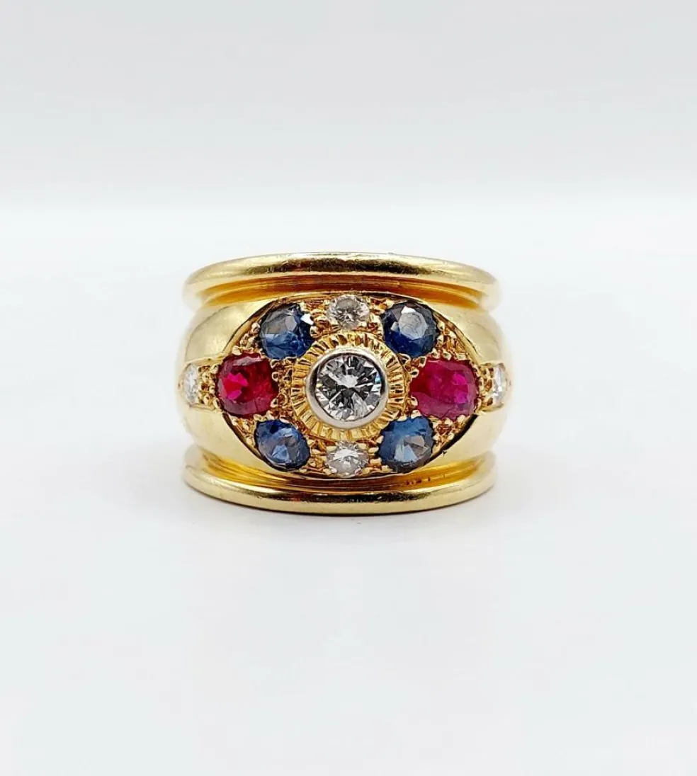 Bague bombée 1960 or, diamant saphirs, rubis
