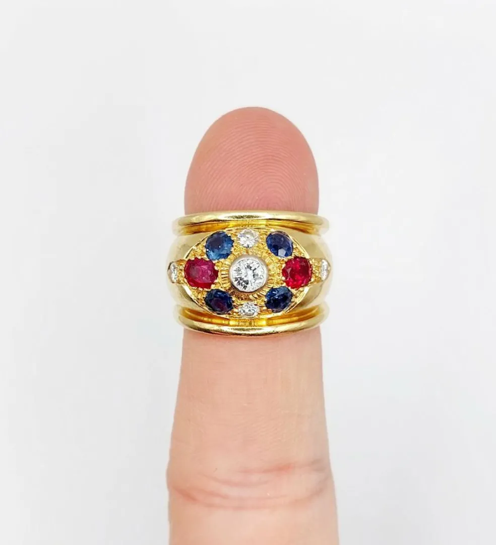 Bague bombée 1960 or, diamant saphirs, rubis