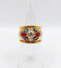 Bague bombée 1960 or, diamant saphirs, rubis