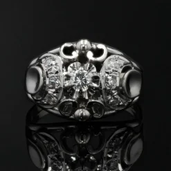 Bague bombée or blanc diamants