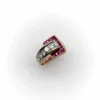 Bague boucle en or diamant et rubis