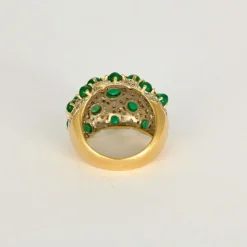 Bague boule deux ors, émeraudes cabochons et diamants