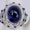 Bague cabochon saphir serti clos en or blanc