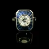Bague calibrée en diamant et saphir
