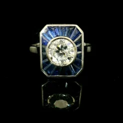 Bague calibrée en diamant et saphir