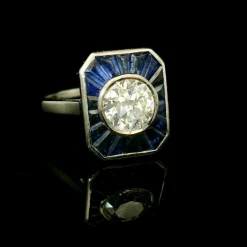 Bague calibrée en diamant et saphir