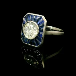 Bague calibrée en diamant et saphir