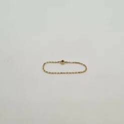 Bague chaine or jaune sertie d'un diamant