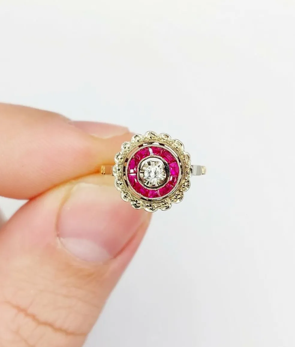 Bague cible Art Déco or rose, diamant, rubis calibrés (circa 1920)