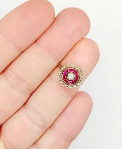 Bague cible Art Déco or rose, diamant, rubis calibrés (circa 1920)